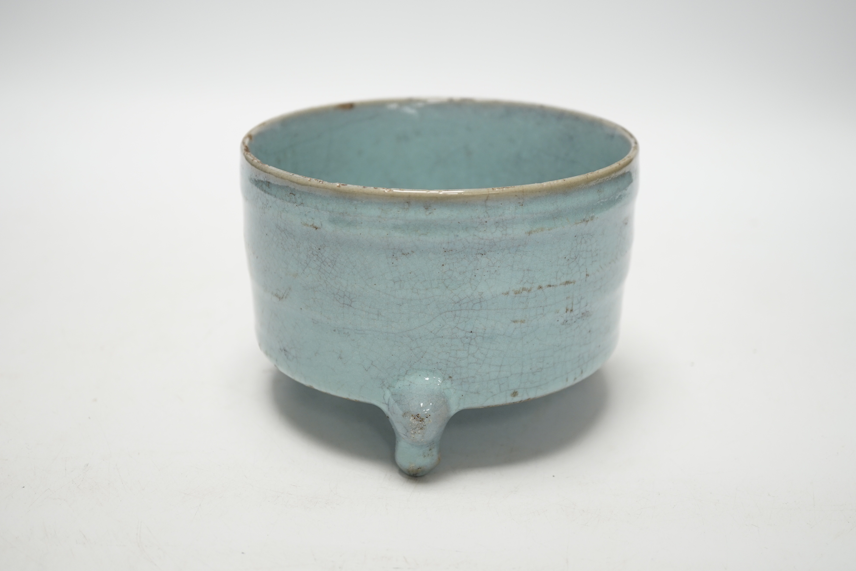 A Chinese Jun type tripod censer, 10cm tall